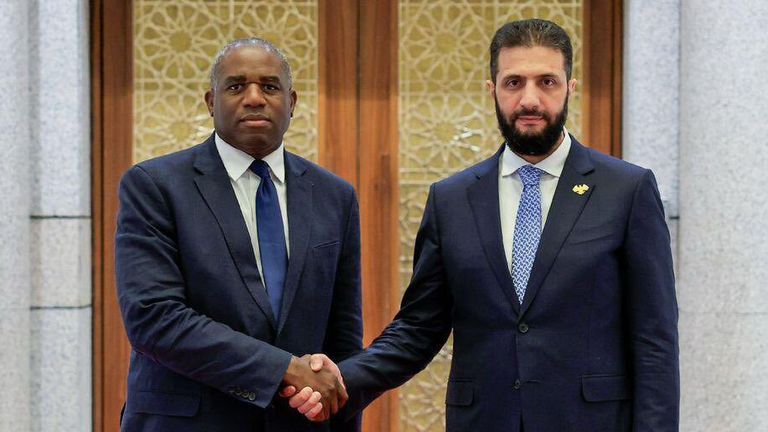 Foreign Secretary David Lammy shakes hands with Syrian interim president Ahmed al-Sharaa in Damascus. Pic: X / @DavidLammy